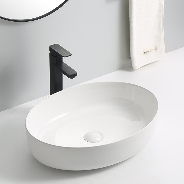 9594- Glossy White Oval shape ceramic basin